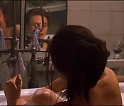 Eva Green nue et couche dans le film Dreamers